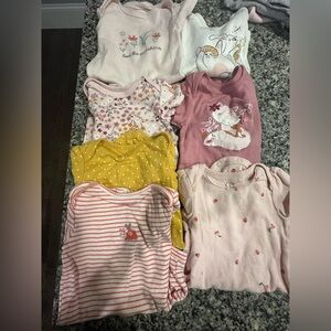 A lot of baby girls 12 month outfits. In good used condition. Mostly Carters.
